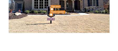 Sign post and phone number detected in property photo